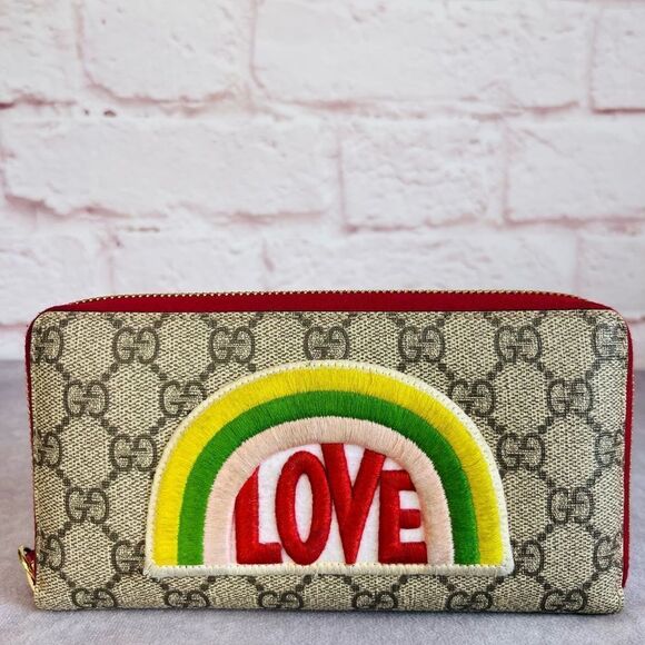 Gucci Handbags - Gucci Rainbow Love Supreme Zippy Wallet